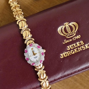 Reloj de cóctel vintage para mujer de Jules Jürgensen con diamantes y rubíes