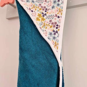 Baby girl&#39;s floral and duck blue bath cape