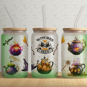 May include: Three frosted glass canisters with bamboo lids and straws. Each canister has a different Halloween-themed design with images of cauldrons, witches, and magic wands. The middle canister has the text "Witches Brew" on it.