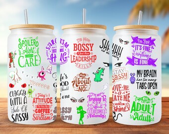 May include: Three white reusable tumblers with bamboo lids and straws. Each tumbler features a different design with colorful text and illustrations. The designs include phrases like "Spoiler Alert I Don't Care", "I'm Not Bossy I Just Have Leadership Skills", and "I'm Fine It's Fine Everything Is Fine".