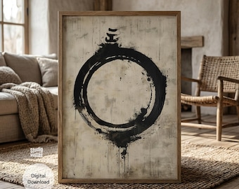 May include: A framed artwork featuring a large black circle with brushstroke details on a beige background. The artwork is in a wooden frame and is displayed in a cozy, rustic living space. The words "Digital Download" are visible.
