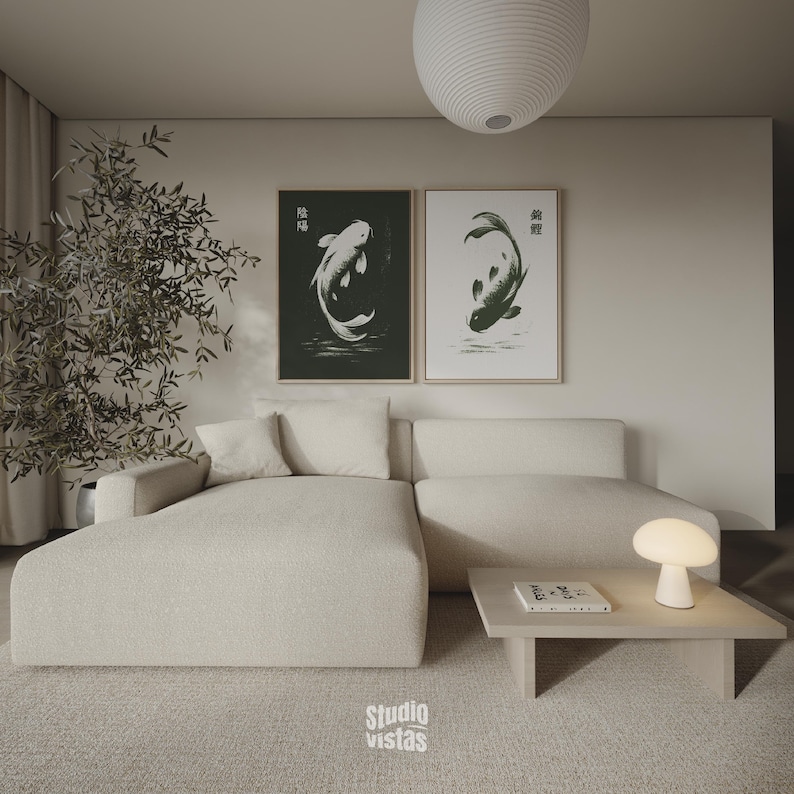 May include: A modern living room with a beige sectional sofa, a light wood coffee table, and two framed koi fish prints. A white mushroom-shaped lamp sits on the table. The room has a neutral color palette with a large rug and a decorative plant.