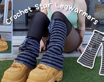 May include: Crochet Star Legwarmers in black and blue stripes with a star detail. The legwarmers are worn by a person with black tights and tan platform shoes.