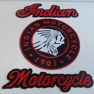 May include: Embroidered patches featuring the "Indian Motorcycle" logo. The patches include the word "Indian" in red script, a circular patch with a Native American profile, and the word "Motorcycle" in red script.