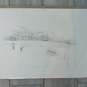 May include: A black and white pencil drawing of a farmhouse in a snowy landscape. Three birds fly in the foreground, and a broken farm implement lies in the snow.