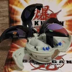 Bakugan BakuSwap Darkus\Haos Oberus 490G + Card - Rare - Used in excellent condition - Battle Brawlers
