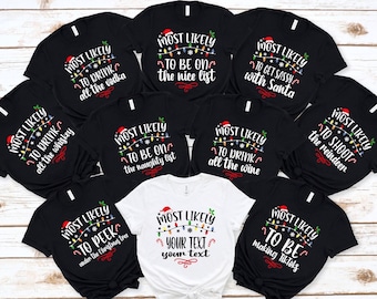 May include: Set of nine black t-shirts with white text and Christmas lights. Each shirt says "Most Likely To" followed by a funny Christmas-themed phrase. One white t-shirt says "Most Likely To" with a space for personalized text.