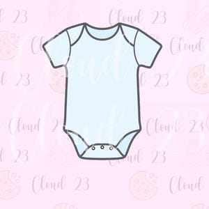 May include: A light blue babygrow cookie cutter with a black outline. The babygrow has short sleeves and three poppers at the bottom. The background is light pink with the words "Cloud 23" and cookie and baking tool graphics.