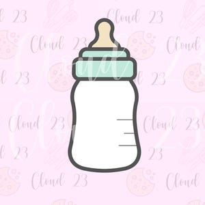 May include: A baby bottle cookie cutter with a white body, a light green cap, and a beige teat. The bottle has black outlines and measurement lines. The background is pink with the text "Cloud 23".