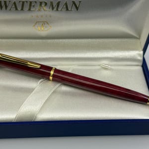 Penna a sfera Waterman Expert • Lacca bordeaux e finiture dorate • Scatola originale • Vintage Francia