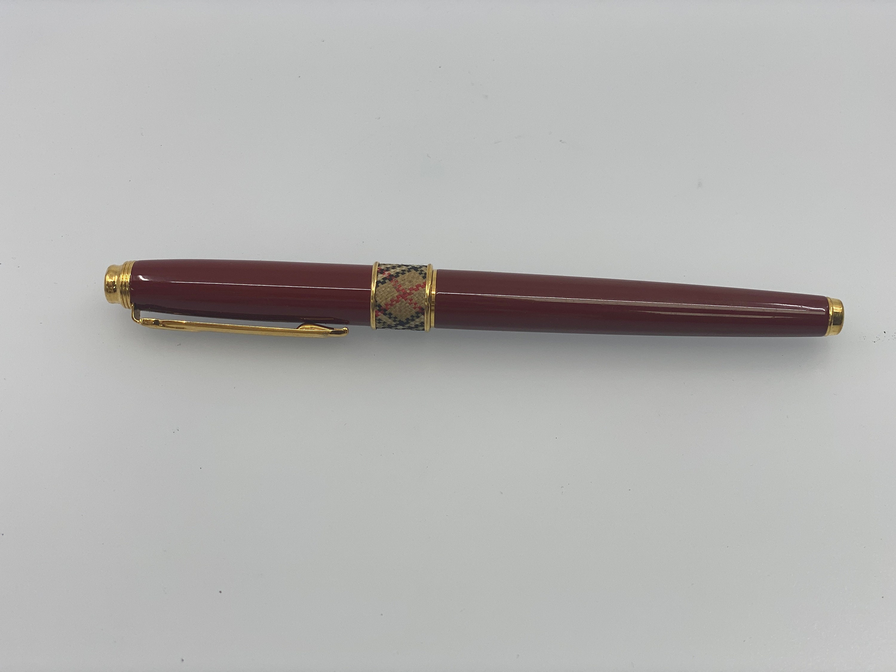 Burberry Roller Pen Burgundy Red With Metal and Textile