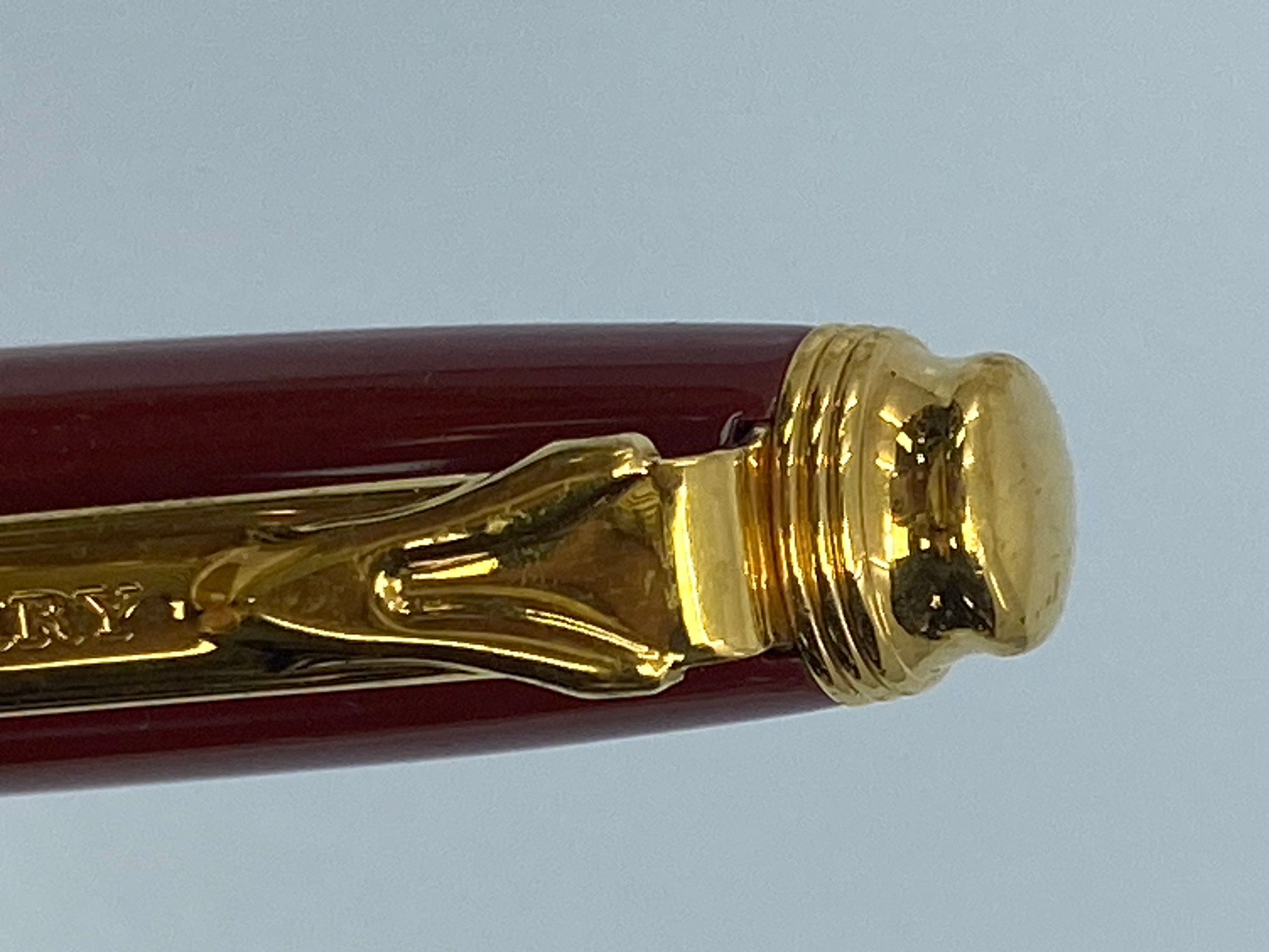 Burberry Roller Pen Burgundy Red With Metal and Textile