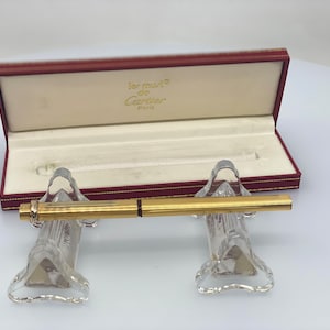 Bolígrafo Cartier Must De Cartier Plaqué Or G en Caja Original - Elegancia Atemporal