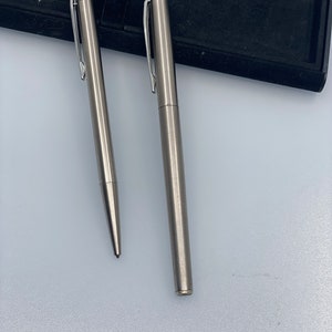 Vintage Montblanc Noblesse Set in Stainless Steel: Ballpoint Pen and Pen with Button and Clip Mechanism image 2