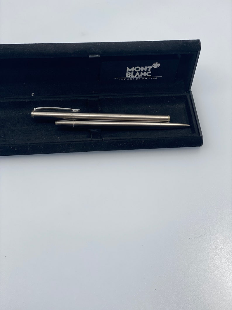 Vintage Montblanc Noblesse Set in Stainless Steel: Ballpoint Pen and Pen with Button and Clip Mechanism image 1