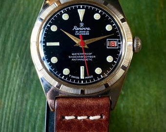 Fabrication suisse - SR RENOVA - fonction date - cadran noir - montre mécanique vintage env. 1965 - révisé