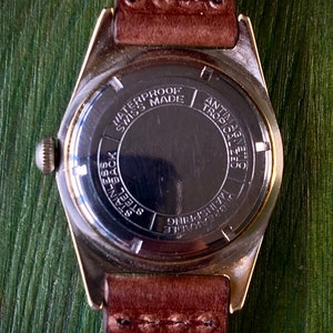 Swiss-made SR RENOVA Datumsfunktion schwarzes Zifferblatt mechanische Vintage Uhr ca. 1965 gewartet Bild 3