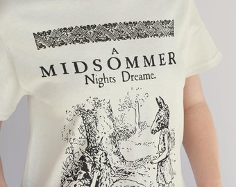 May include: A white t-shirt with a black print of a book cover. The book title is "A Midsummer Nights Dream."