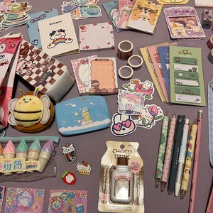 Kawaii Stationery Mystery Box, Grab Bag, kawaii pens, notebooks, stickers, pencils cases, keychains, and more.