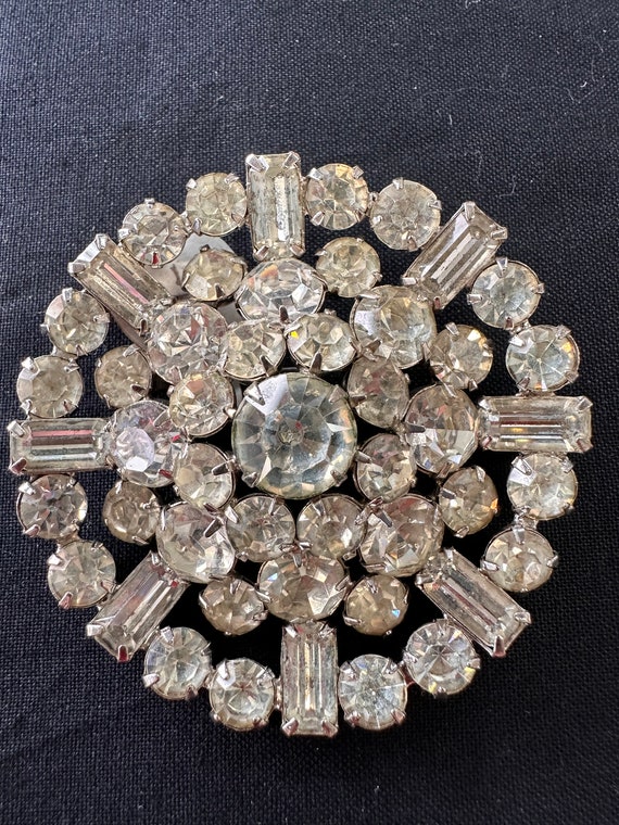 A Round Rhinestone Brooch