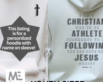 May include: White youth-sized hoodie with a cross on the front and the text "I am a Christian who is an athlete unashamed to follow the one true God Jesus Christ Romans 1:16" on the back.