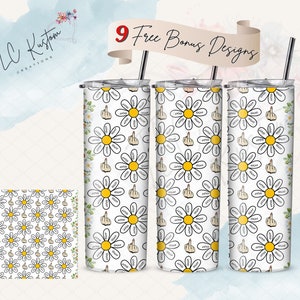 May include: Three stainless steel tumblers with a white background and a repeating pattern of black and yellow daisies with a middle finger in the center of each daisy. The text "SLAP" is written on the petals of each daisy.