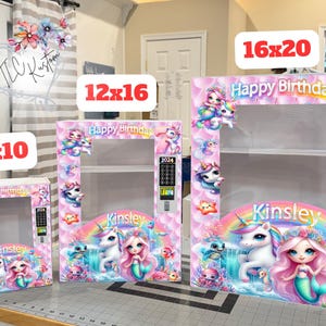 May include: Three pink and white birthday-themed display boxes in 8x10, 12x16, and 16x20 inch sizes. Each box features a mermaid, unicorn, and rainbow design with the text "Happy Birthday" and "Kinsley".