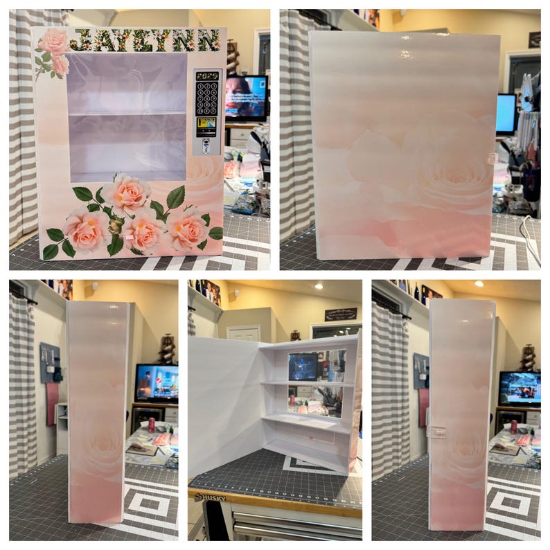 May include: A decorative vending machine with a floral design. The front features a clear window, shelves, and a keypad. The exterior is adorned with pink roses and the name "JAYLYNN". The sides and top have a soft pink and white gradient.