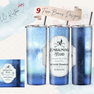 May include: Three stainless steel tumblers with a blue, icy design. Each tumbler has a white label with a skull and crossbones and the text "EMBALMING FLUID" with the words "BEAUTIFY FROM THE INSIDE OUT" and "ARTERIAL CHEMICAL POISON" underneath.