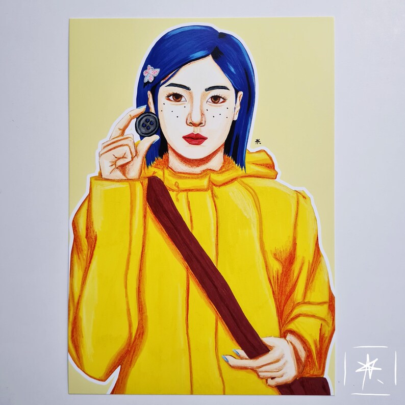 May include: A hand-drawn illustration of a woman with blue hair wearing a yellow raincoat and holding a button. The woman has freckles and is looking at the button.