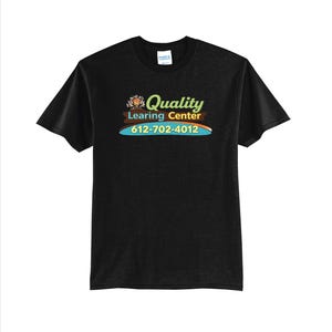 May include: Black t-shirt with the words "Quality Learning Center" in a colorful design. The design includes a phone number, 612-702-4012, in a blue and orange banner. The shirt is made of a soft material.