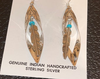 Navajo handmade sterling silver turquoise earrings feather