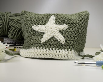 Green crochet cat beanie with star and pompoms