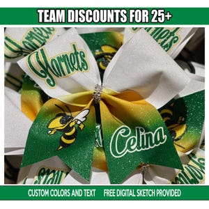 May include: Cheerleading bow with green, yellow, and white glitter accents. The bow features the word "Hornets" and the name "Celina" in white script. A cartoon bee graphic is also visible. The text "TEAM DISCOUNTS FOR 25+" and "CUSTOM COLORS AND TEXT FREE DIGITAL SKETCH PROVIDED" are also visible.