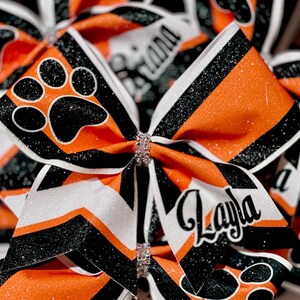 TEAM DISCOUNTS AVAILABLE - Custom Sublimated Paw Print Cheer Bow ...
