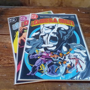 the omega men comic book bundle of 3 #23 Feb. 1985 f-vf cond.,#29 Aug. 1985 nm cond.,#32 Nov. 1985 f cond. DC comics
