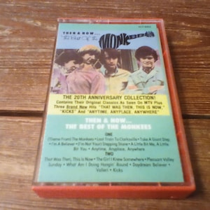 the best of the Monkees cassette tape then and now featuring the theme from the monkeys, last train to Clarksville, and others