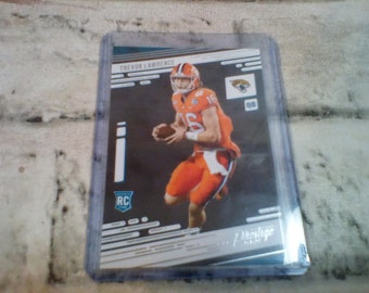 Trevor Lawrence Rookie Card 2021 Prestige #201 Football Card, Panini Raw Near Mint