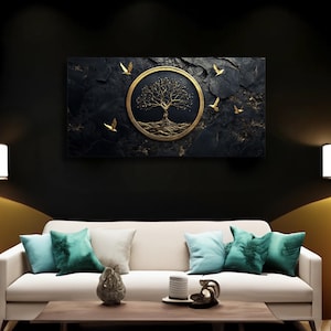 May include: A gold tree of life with birds flying around it, set against a black and gold textured background. The image is framed and hanging on a wall above a white sofa.