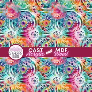 May include: A vibrant, colorful pattern featuring watercolor-style designs in shades of teal, pink, orange, and yellow. The design includes circular, mandala-like shapes. The text "CAST Acrylic and MDF Wood" is displayed on a burgundy banner.