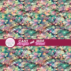 May include: A festive pattern featuring Christmas tree branches adorned with colorful string lights. The design has a blurred, watercolor effect with a mix of green, pink, yellow, and blue hues. The text "CAST Acrylic and MDF Wood" is displayed on a burgundy banner.
