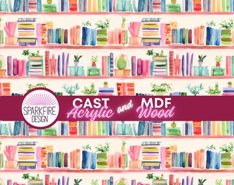 May include: Watercolor pattern featuring bookshelves filled with colorful books and potted plants. The design includes a repeating pattern of shelves with books in shades of blue, pink, orange, and green. The text "CAST Acrylic and MDF Wood" is included.