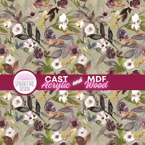 May include: A floral pattern featuring watercolor-style flowers in shades of purple, white, and brown, set against a muted green background. The design includes leaves and branches, creating a natural, artistic aesthetic. The text "CAST Acrylic and MDF Wood" is displayed.