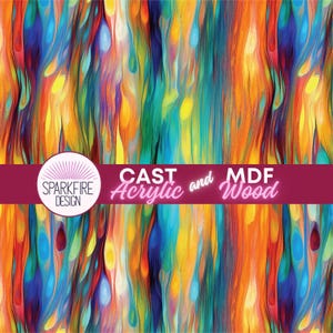May include: Abstract art design with vertical brushstrokes in vibrant colors of orange, yellow, blue, and green. The design includes the text "CAST Acrylic and MDF Wood" and the "SPARKFIRE DESIGN" logo.