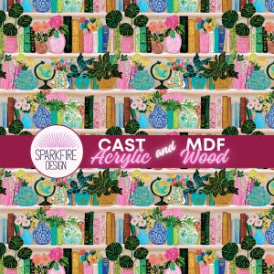 May include: A repeating pattern featuring shelves filled with books, plants, vases, and globes. The color palette includes pink, blue, green, and gold. The text "SPARKFIRE DESIGN" and "CAST Acrylic and MDF Wood" are visible.