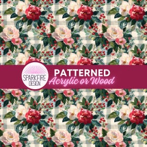 May include: A repeating pattern featuring red and white roses, green leaves, and small red berries set against a light gray and white buffalo check background. A magenta horizontal banner displays the text SPARKFIRE DESIGN PATTERNED Acrylic or Wood.