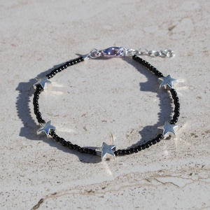 Black Beaded Bracelet with Silver Star Charms