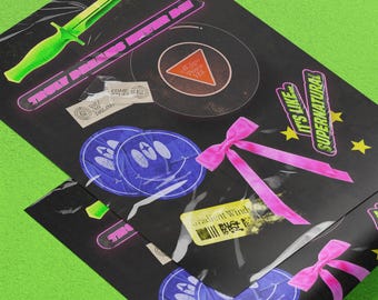 May include: A black background with various colorful stickers and graphics. The stickers include a green knife, a pink and black bar with the text "You Don't Know What You're Doing", a pink and black circle with the text "All Signs Point To Yes", a pink and black sticker with the text "Come Stay In My Dreams", a blue smiley face sticker, a pink bow, a yellow star sticker, a pink and yellow sticker with the text "It's Like Supernatural", and a sticker with the text "Gradient Winds" and a barcode.