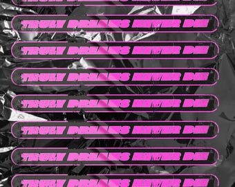 May include: A repeating pattern of the phrase "Truly Dreams Never Die" in pink text on a black and silver foil background.