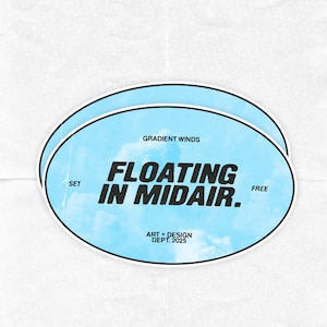 May include: Two oval stickers with a light blue sky design and the words "FLOATING IN MIDAIR." The stickers have a black border and the text "GRADIENT WINDS," "SET," "FREE," and "ART + DESIGN DEPT. 2025."